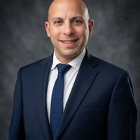 Dr. Arash Razi, DDS